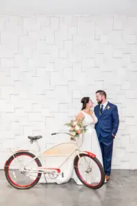 Bride and Groom with Beach Cruiser Bike Wedding Portrait | Bride and Groom Veil Wedding Portrait | Tampa Photographer Mary Anna Photography | Venue The Epicurean