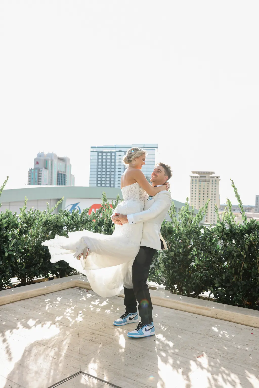 Bride and Groom First Look Rooftop Wedding Portrait Tampa Skyline | Photographer Lifelong Photography