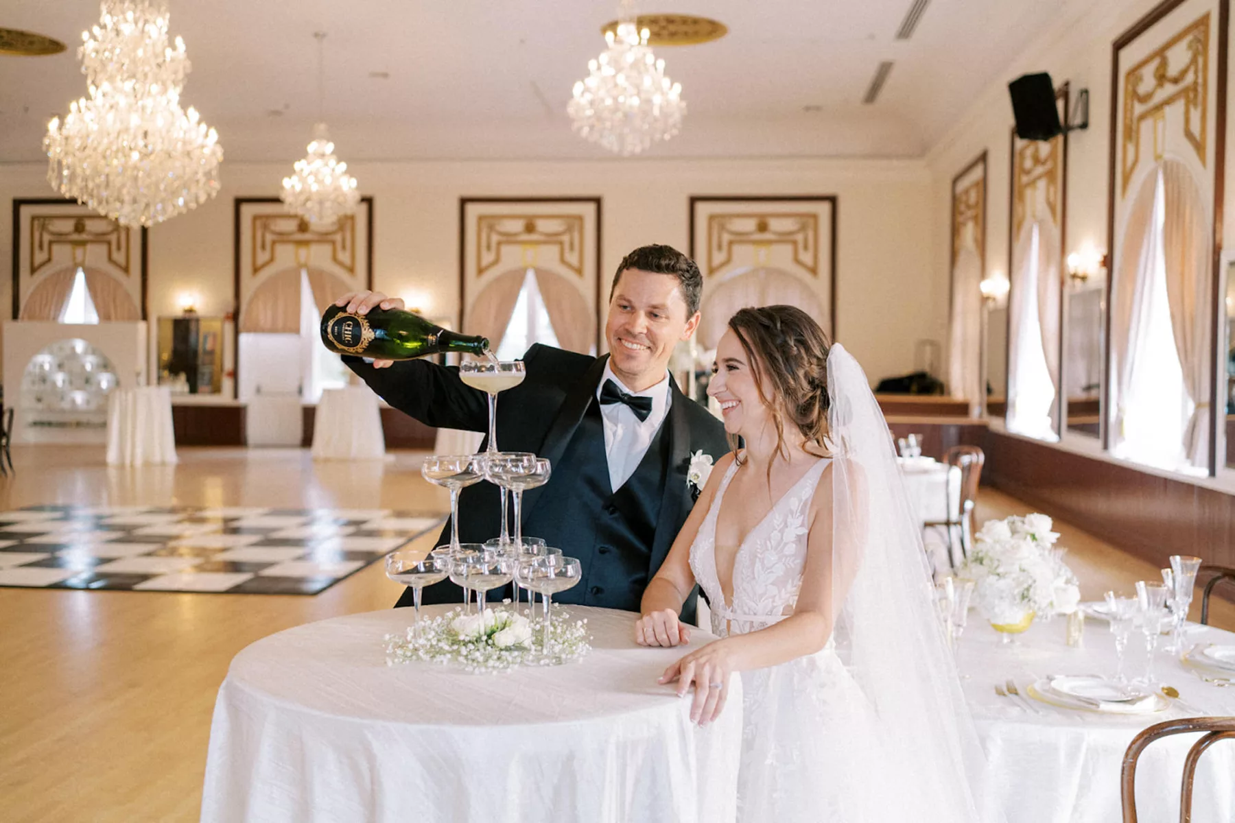 Bride and Groom Champagne Tower Inspiration for Classic White Wedding Reception Inspiration | Historic Ybor Venue Centro Asturiano | Photographer Eddy Almaguer Photography