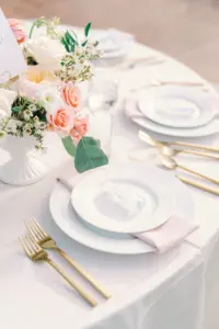 Elegant White and Dusty Pink Wedding Reception Tablescape with Gold Flatware Inspiration | Pink Roses, White Alyssum, and Greenery Centerpiece Ideas | Wedding Favor Inspiration Mini Hand Sanitizer