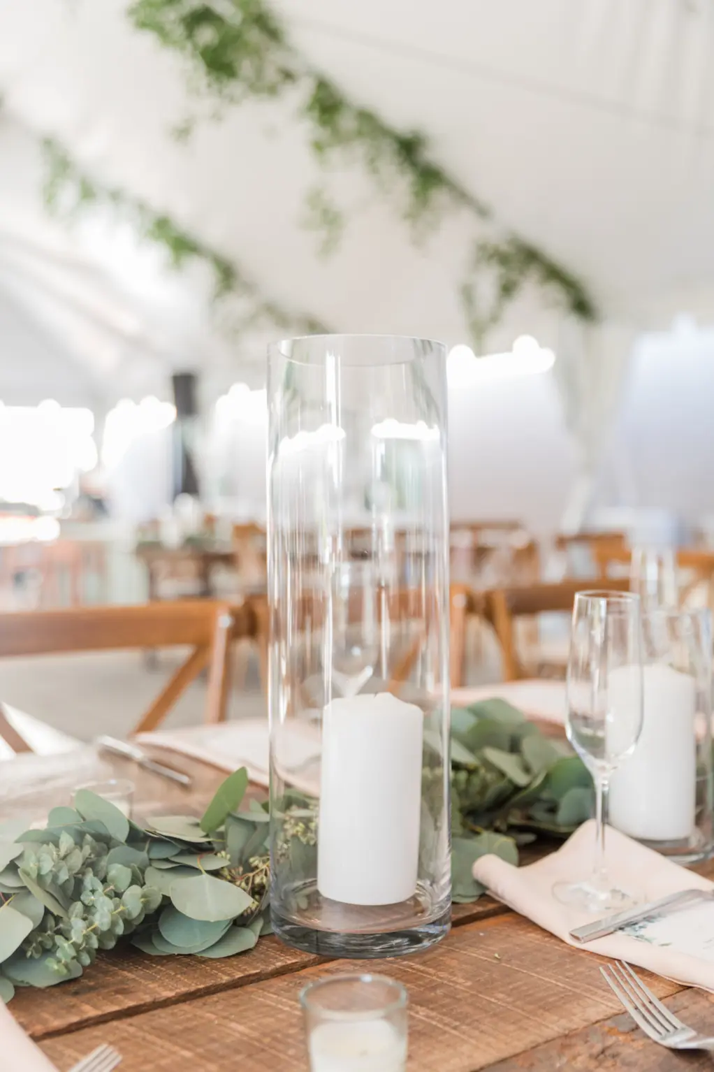 Pillar Candles with Hurricane Glass and Eucalyptus Wedding Reception Centerpiece Decor Inspiration