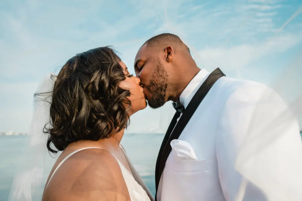 Bride and Groom Sunset on Bayshore Wedding Portrait | Tampa Photographer and Videographer Iyrus Weddings