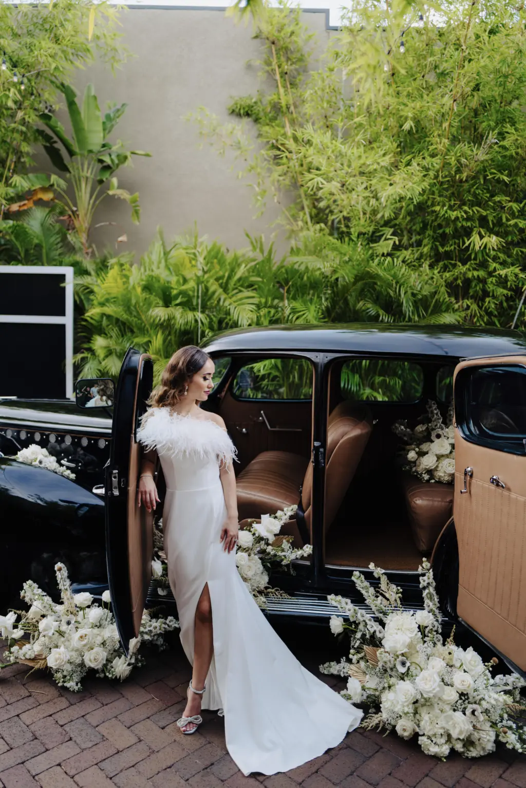 Black Vintage Wedding Getaway Car | Tampa Transportation Rental Classically Ever After | Florist Marigold Flower Co | Photographer Mcneile Photography | Videographer Sabrina Autumn Photography | Hair and Makeup Michele Renee The Studio | Planner Kelci Leigh Events | Dress Truly Forever Bridal