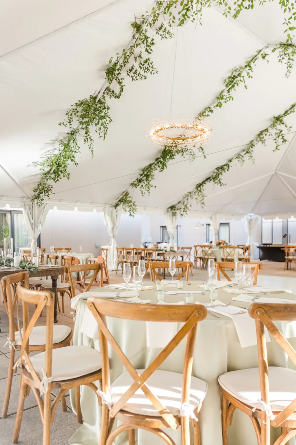 White Tented Boho Wedding Reception with Hanging Eucalyptus | Wooden Crossback Chairs