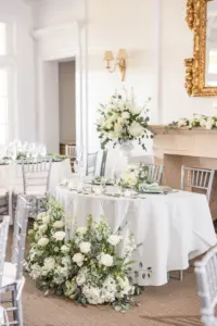 White Rose, Stock Flowers, Hydrangeas, Eucalyptus and Greenery Flower Arrangement | Elegant White and Green Wedding Reception Sweetheart Table Decor Ideas | Tampa Bay Event Venue The Concession Golf Club | Sarasota Florist Beneva Flowers and Plantscapes