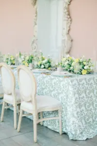 Summer Italian Damask Pattern Tablecloth Linen with Whitewash Louis Chairs and White and Pink Rose Flower Wedding Reception Centerpiece Decor Inspiration