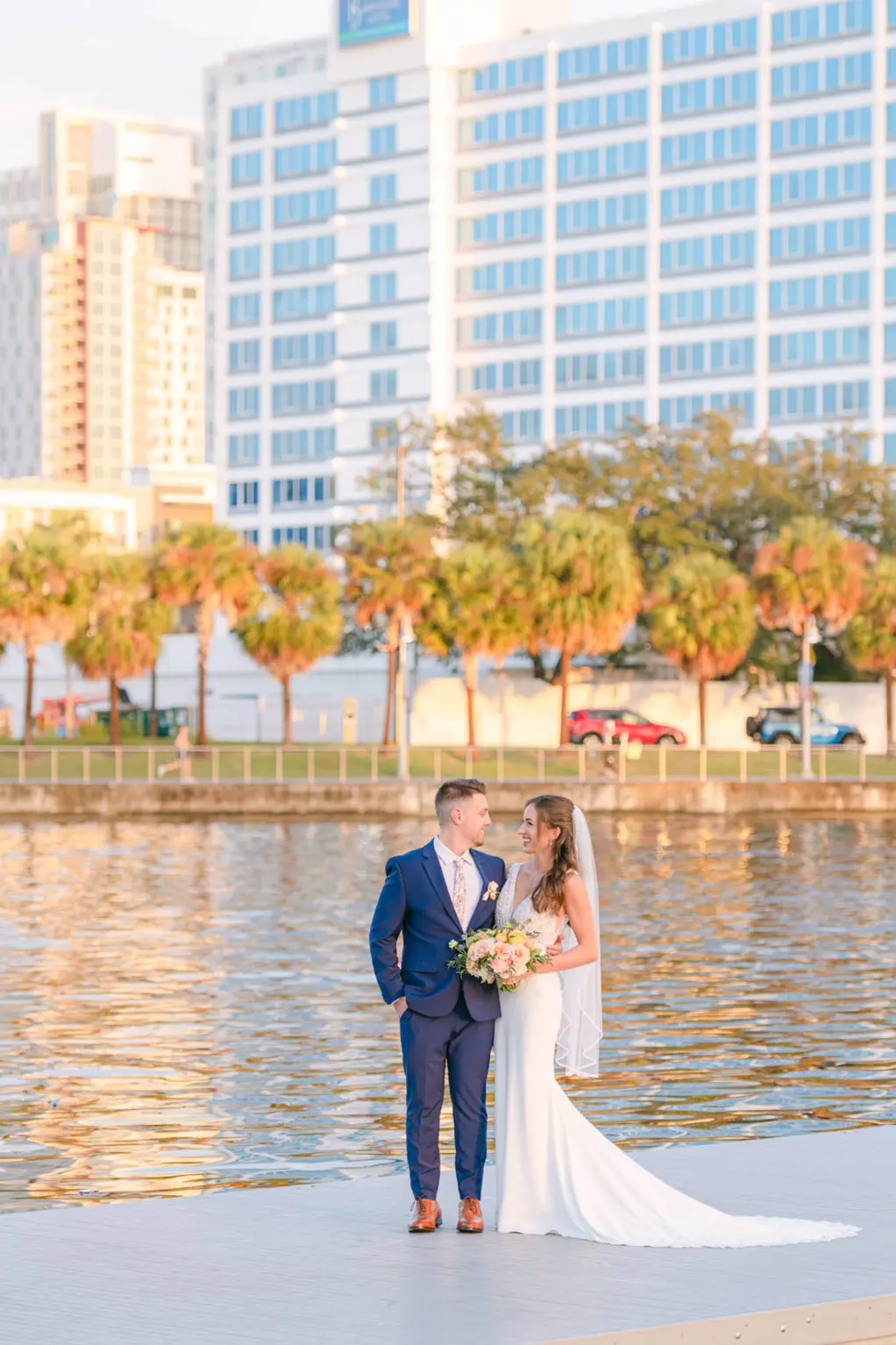 Bride and Groom Sunset Downtown Tampa Riverwalk Dock Wedding Portrait
