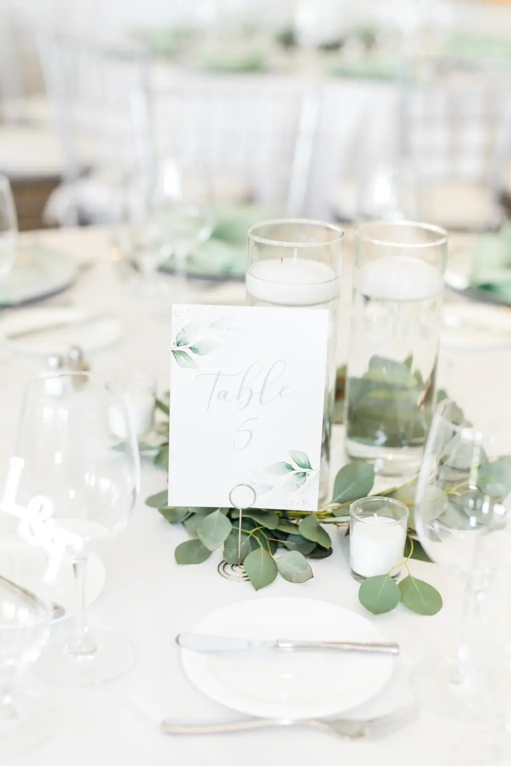 Elegant Green and White Wedding Reception Simple Minimalist Table Decor Ideas | Floating Candles and Greenery Garland Centerpiece Inspiration | Watercolor Greenery Table Number