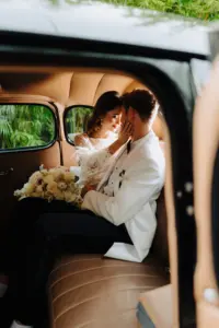 Bride and Groom in Classic Getaway Car Wedding Portrait | Tampa Bay Photographer McNeile Photography | St Pete Car Rental Service Classically Ever After