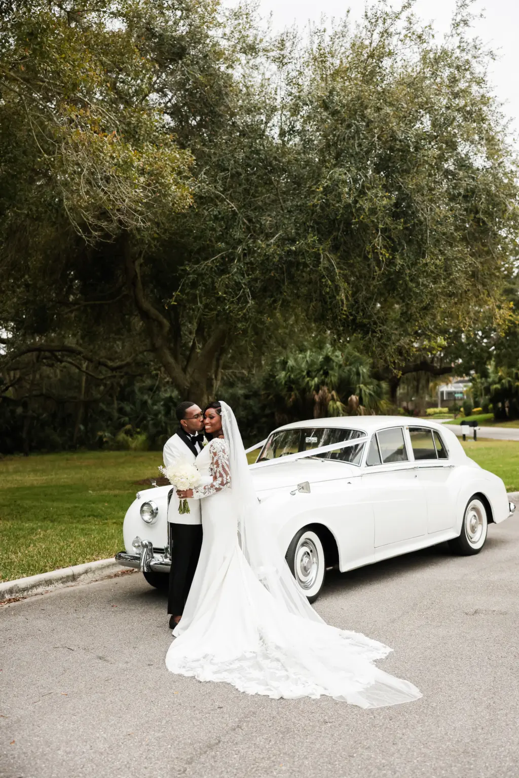 Bride and Groom in Front of White Classic Vintage Car Wedding Portrait | Tampa Bay Photographer Lifelong Photography Studio