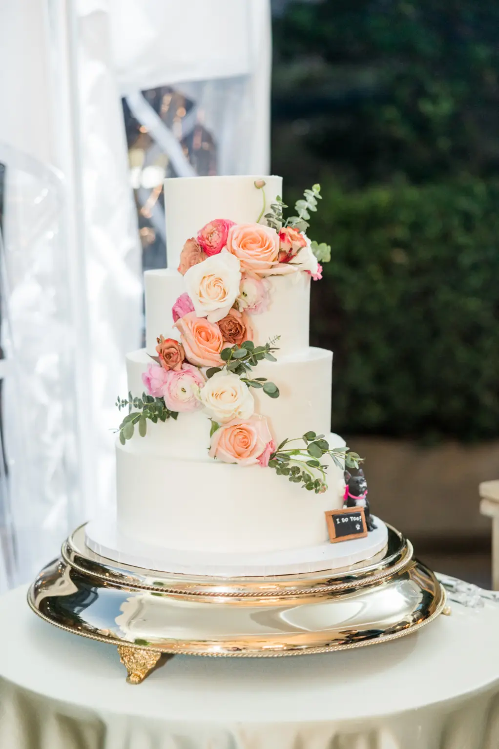 Round White Four-Tiered Wedding Cake with Pink and Orange Rose Flower Accents Ideas