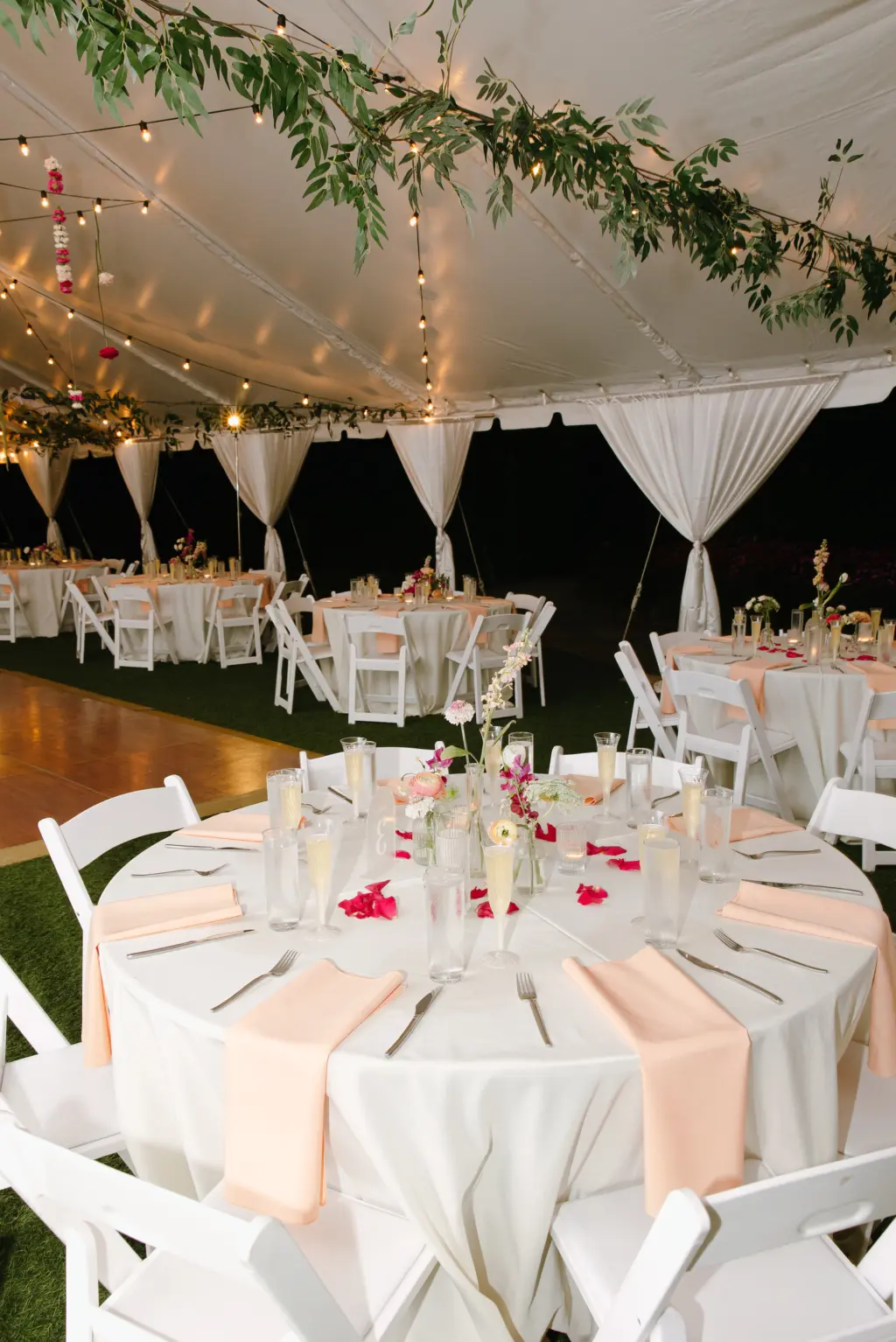 White and Pink Tented Garden Wedding Reception Decor Inspiration | Wildflowers in Bud Vases Centerpiece Ideas | Round Tables and Folding Garden Chairs