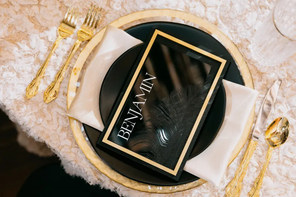 Modern 1920s Great Gatsby Inspired Black and Gold Wedding Reception Table Setting Inspiration | Menu Card Ideas | Textured Tablecloth | Tampa Bay Kate Ryan Event Rentals