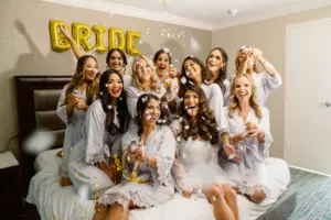 Bride and Bridesmaids Getting Ready Wedding Portrait | Matching Satin Robes Ideas