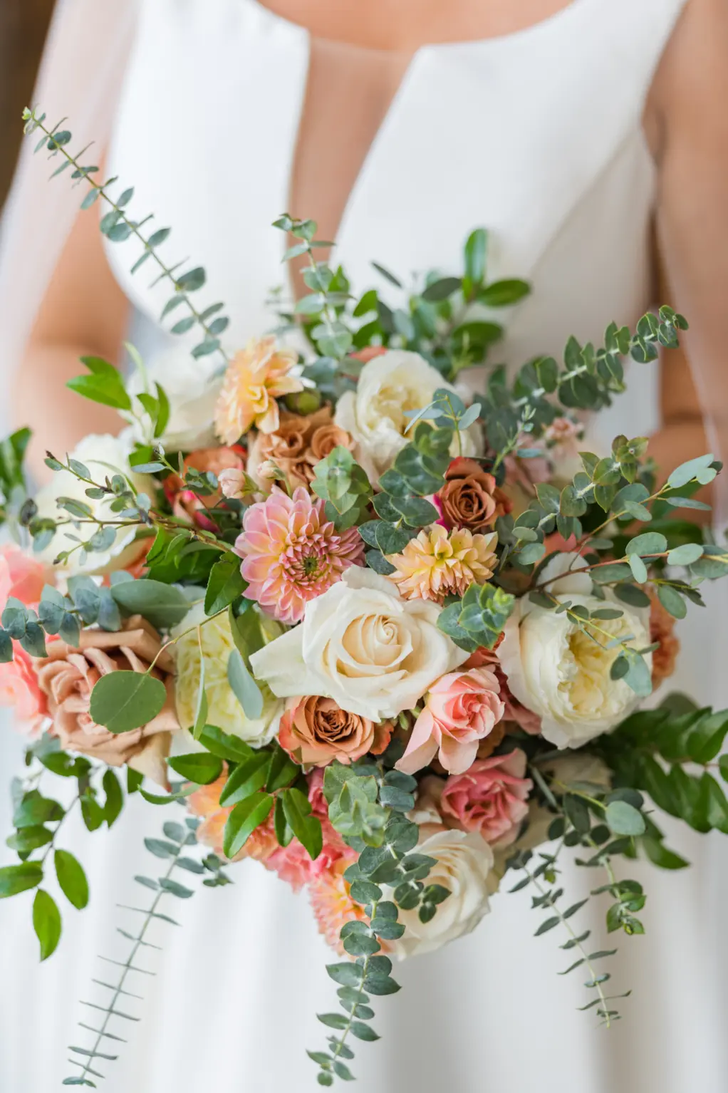 Bridal Wedding Bouquet with Yellow, Peach, Orange, and Pink Roses, Dahlia, and Eucalyptus Greenery Ideas