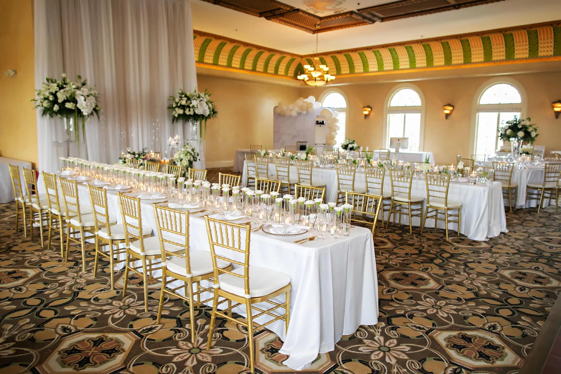 Classic White Italian Inspired Wedding Reception Decor Inspiration | White Drapery, Long Feasting Tables, Gold Chiavari Chairs | Ybor Planner Coastal Coordinating | Outside The Box Event Rentals