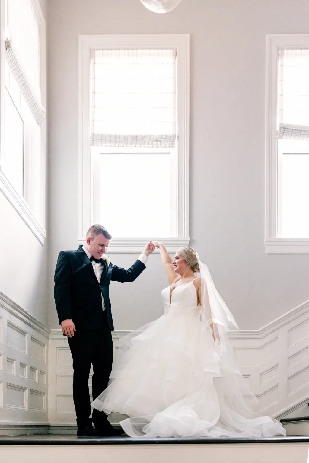 Bride and Groom Dancing on the Stairs Wedding Portrait