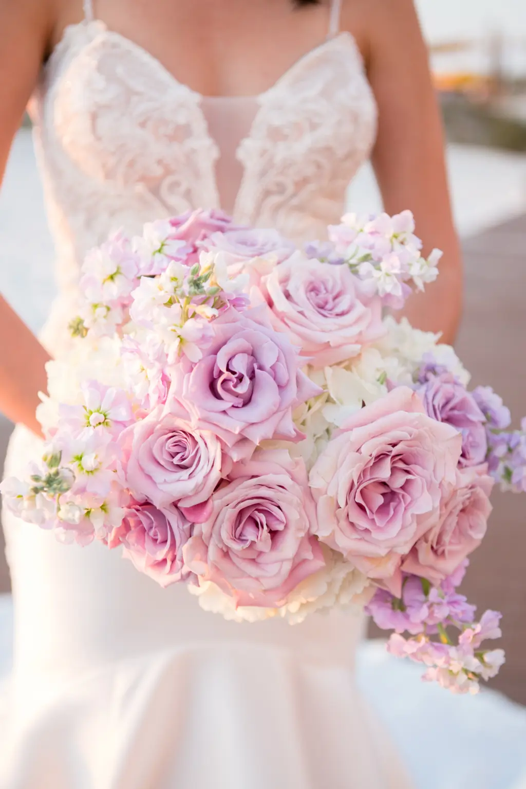 Pastel Pink and Purple Roses, White Hydrangeas, and Stock Flowers Bridal Bouquet Inspiration