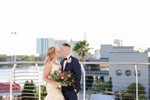 Romantic Bride and Groom Rooftop Wedding Portrait | Tampa Bay Event Venue The Florida Aquarium | Photographer Lifelong Photography