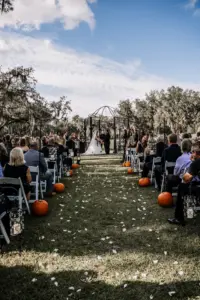 Elegant Halloween Pumpkin Wedding Ceremony Aisle Decor Ideas | Dade City Tampa Bay Event Venue Stonebridge Events