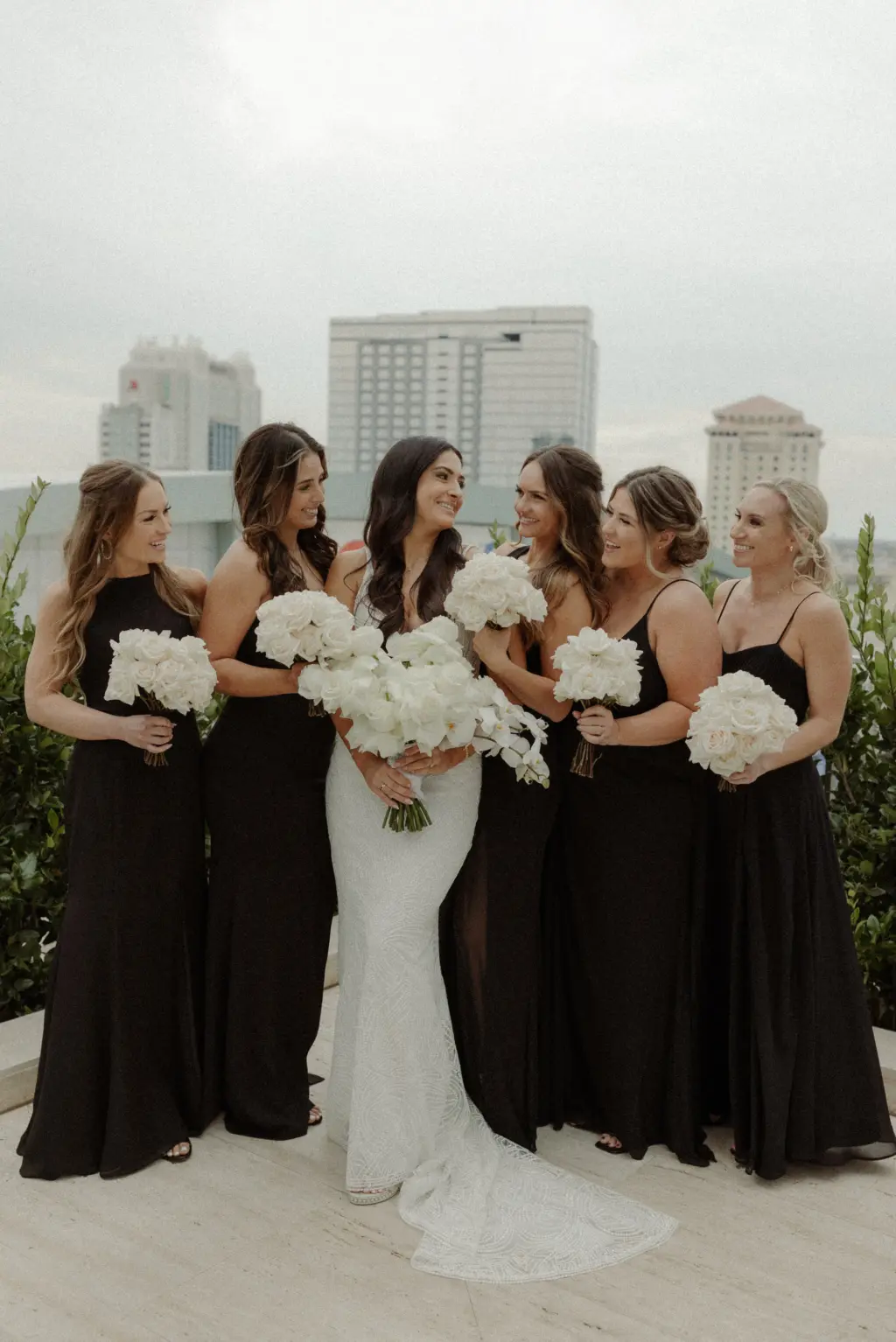 Mismatched Black Bridesmaids Wedding Dress Ideas | White Rose Bouquet Inspiration | Tampa Bay Event Planner Breezin' Weddings