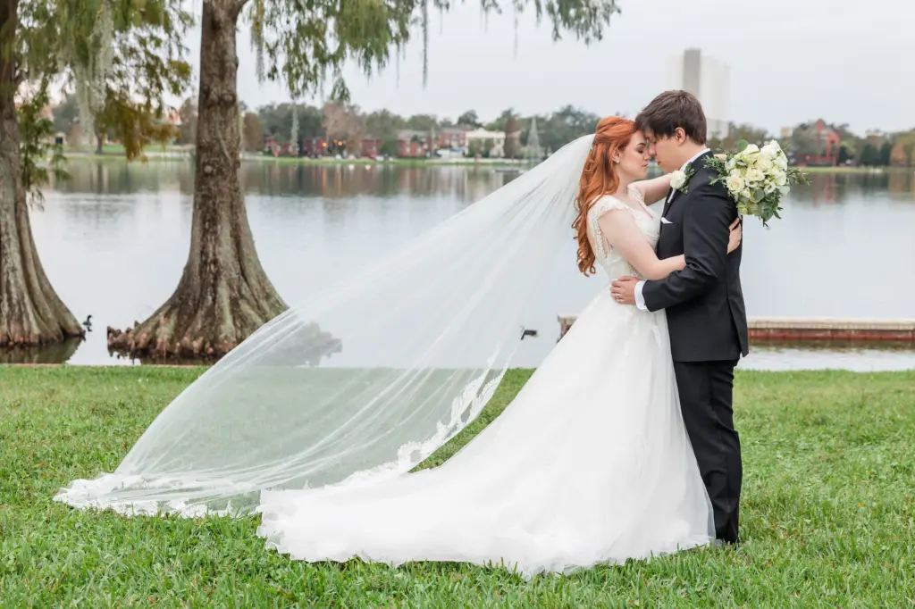 Intimate Bride and Groom Lakeside Wedding Portrait | Tampa Bay Photographer Mary Anna Photography | Lakeland Event Venue Junior League Building