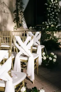 Elegant White Crisscross Sash Drapery over Gold Chiavari Chairs Wedding Ceremony Aisle Decor Ideas