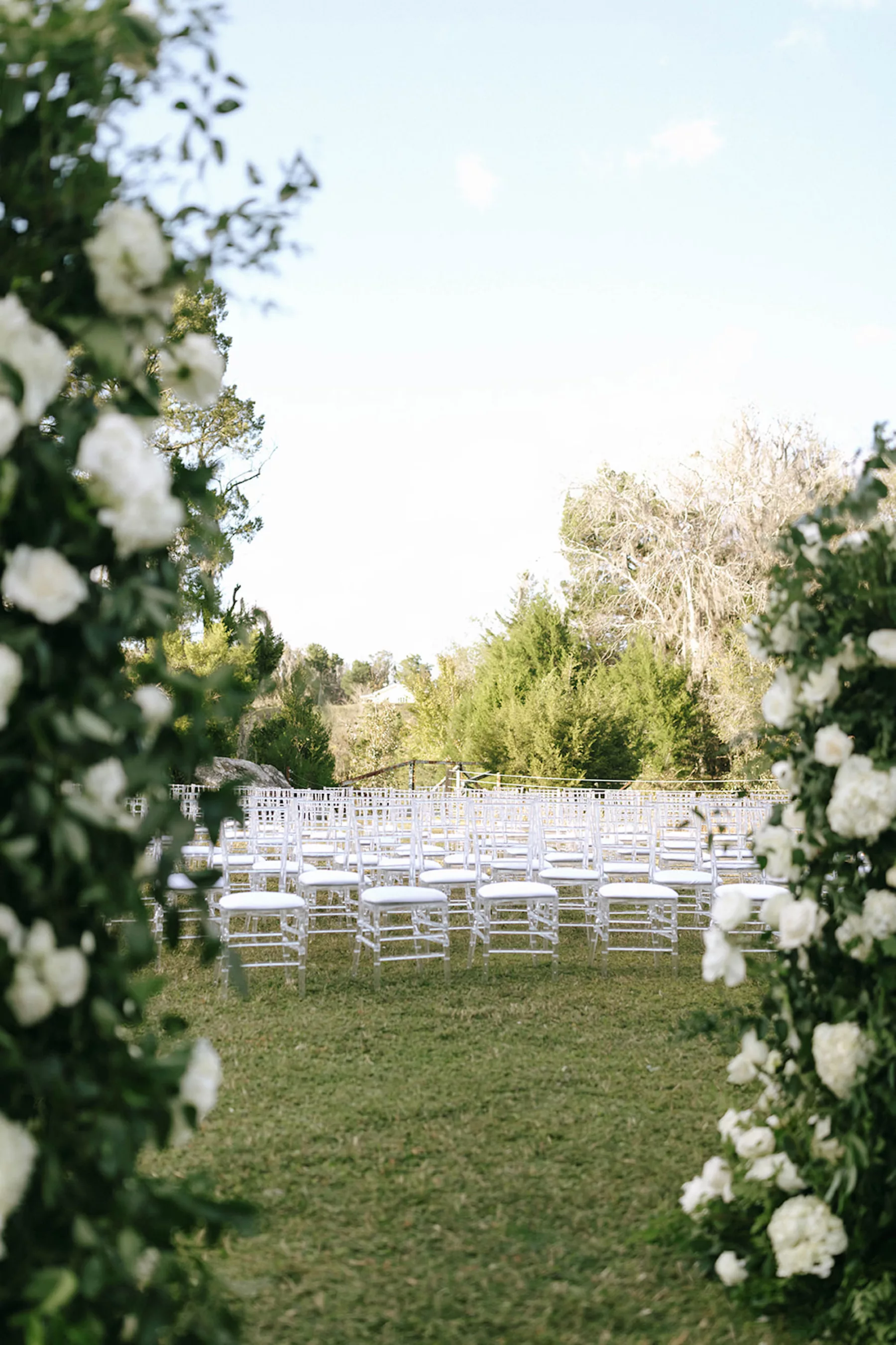 Chiavari Ghost Chairs for Modern Outdoor Wedding Ceremony