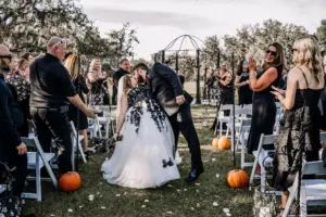 Bride and Groom Just Married Wedding Portrait | Elegant Halloween Pumpkin Wedding Ceremony Aisle Decor Ideas