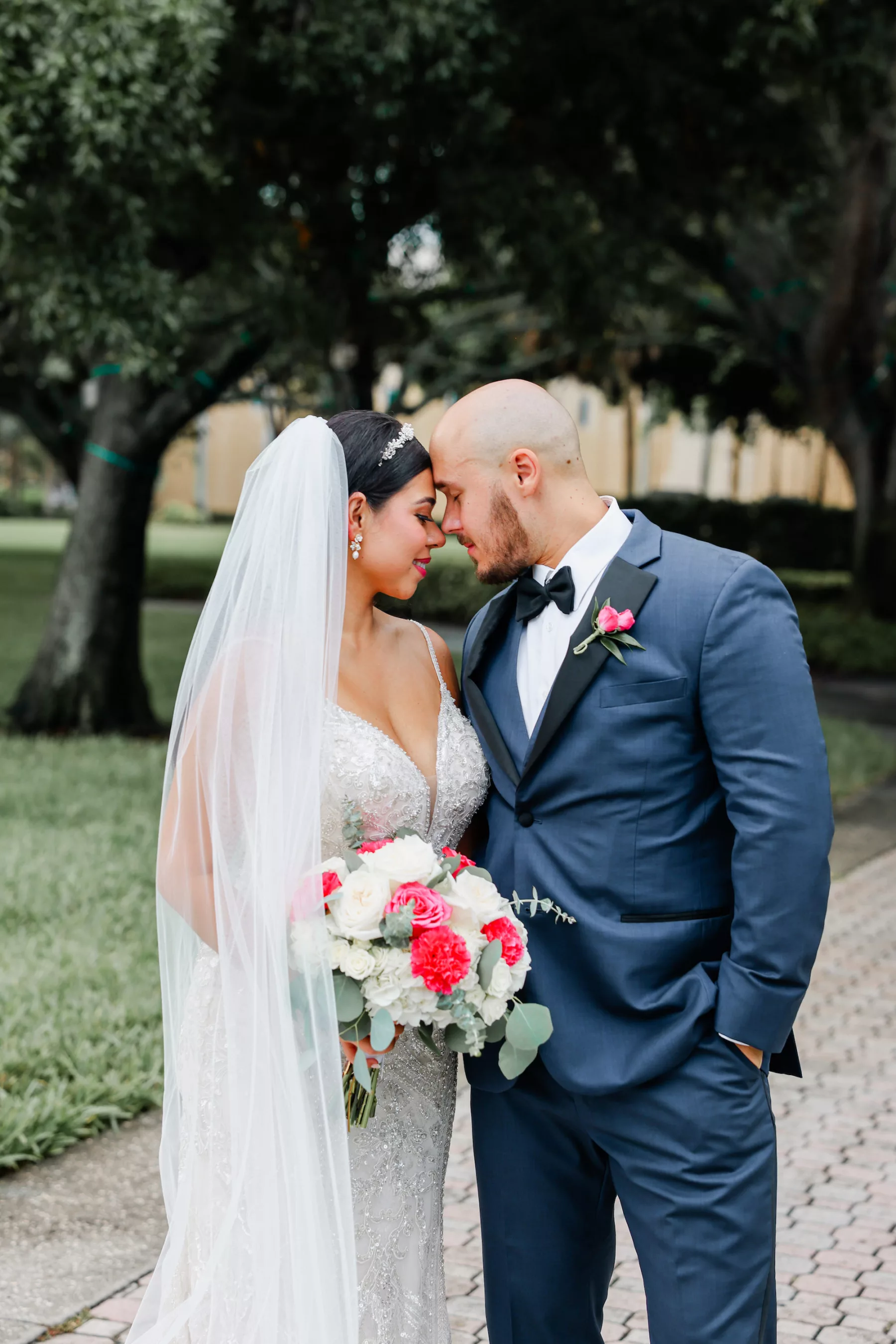 Intimate Bride and Groom Wedding Portrait | Navy and Black Groom;s Tuxedo Attire Inspiration | Tampa Bay Photographer Lifelong Photography Studio