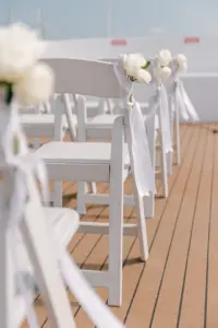 White Folding Garden Chairs with White Rose Wedding Ceremony Aisle Decor Inspiration