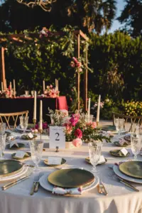 Boho Modern Wedding Reception Centerpiece Decor Ideas | Floral Napkins with Sage Green Plates Place Settings | Waterfront Sarasota Florida Event Venue Marie Selby Gardens