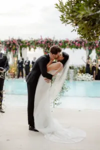Bride and Groom Kiss Wedding Portrait | Tampa Bay Planner Breezin Weddings