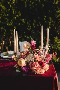 Boho Wedding Reception Sweetheart Table Decor Ideas | Pink and Burgundy Roses, and Stock Flower Arrangement Inspiration