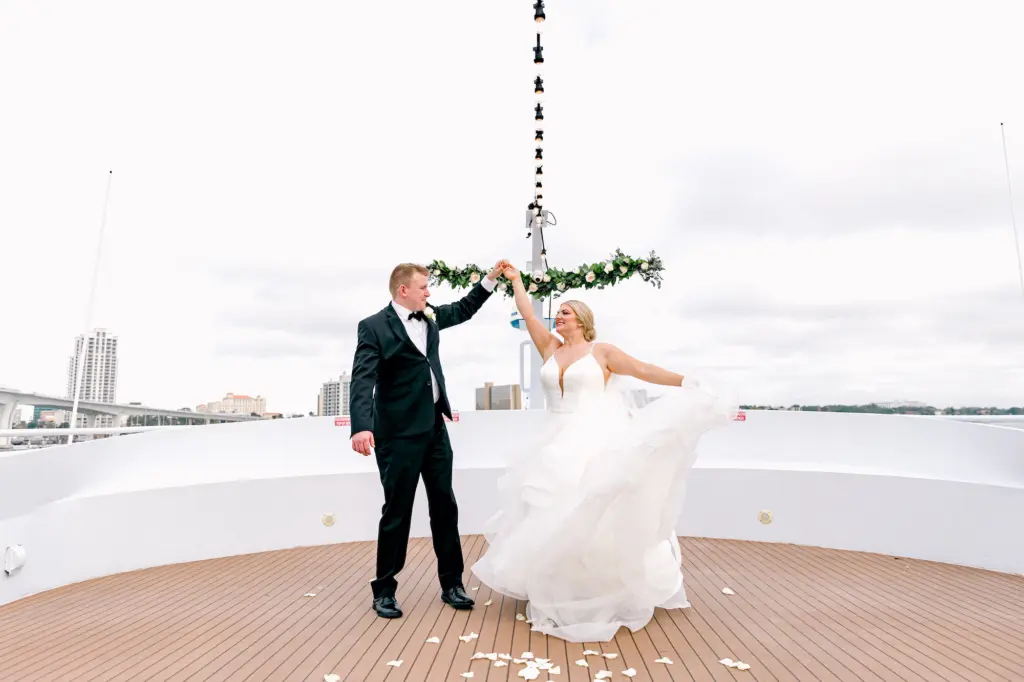 Bride and Groom Dancing on Bow of the Boat Wedding Portrait | Clearwater Event Venue Yacht StarShip