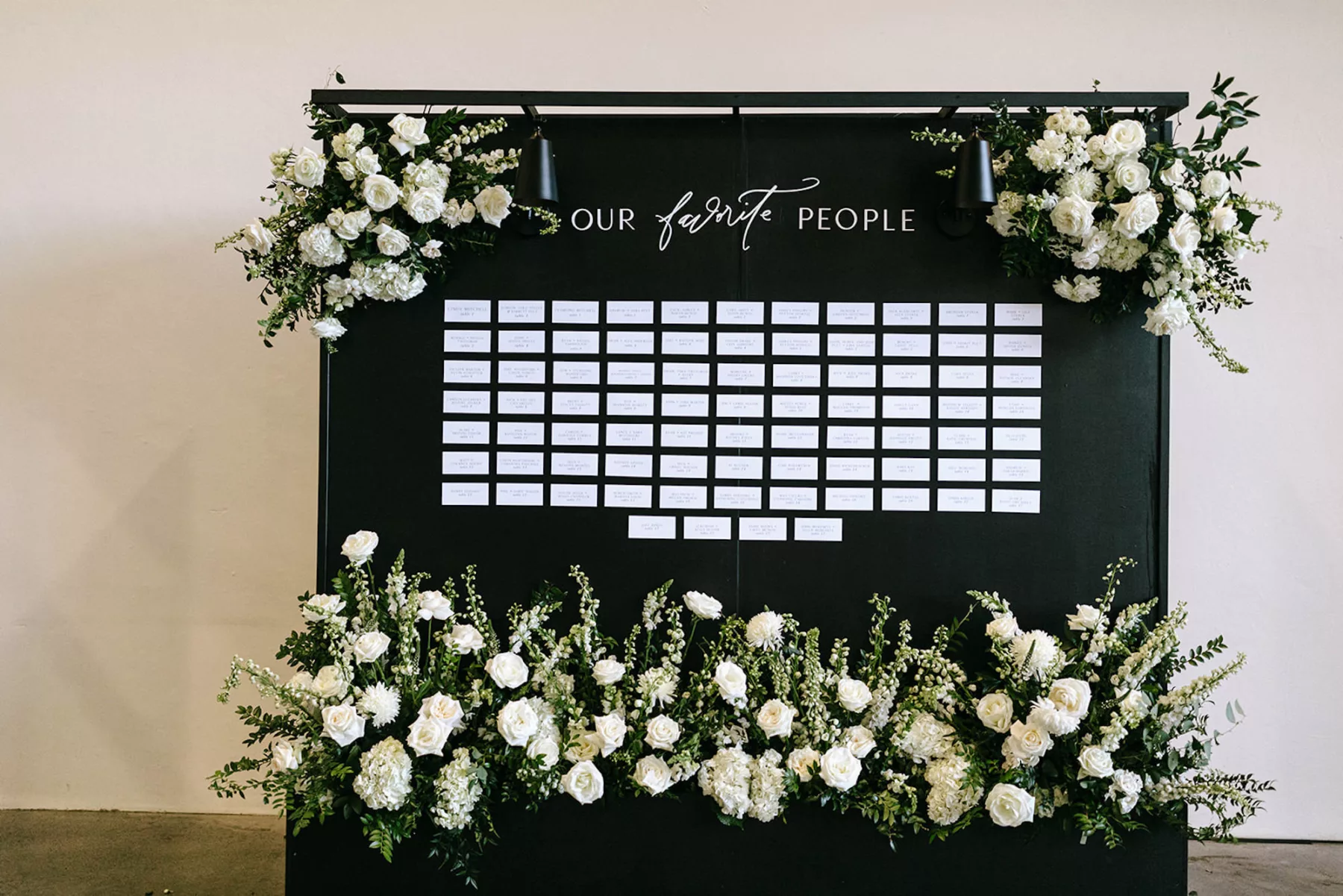 Modern Black and White Our Favorite People Wedding Reception Seating Chart Inspiration | White Roses, Hydrangeas, Chrysanthemums, Snapdragons and Greenery Floral Arrangement | Tampa Bay Florist Bloom Shakalaka