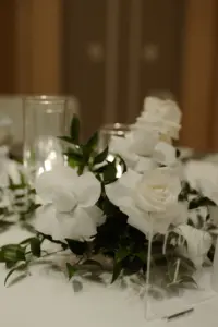 Modern Black and White Wedding Reception with White Rose and Greenery Centerpiece Decor Inspiration