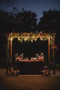 Whimsical Boho Wedding Reception Sweetheart Table Under Pergola Decor Inspiration