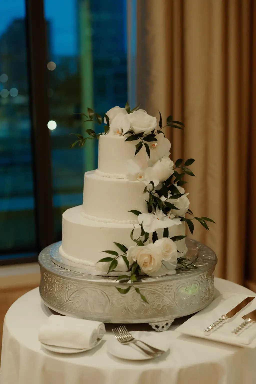 Three Tiered Classic White Round Buttercream Wedding Cake with Roses and Greenery Ideas