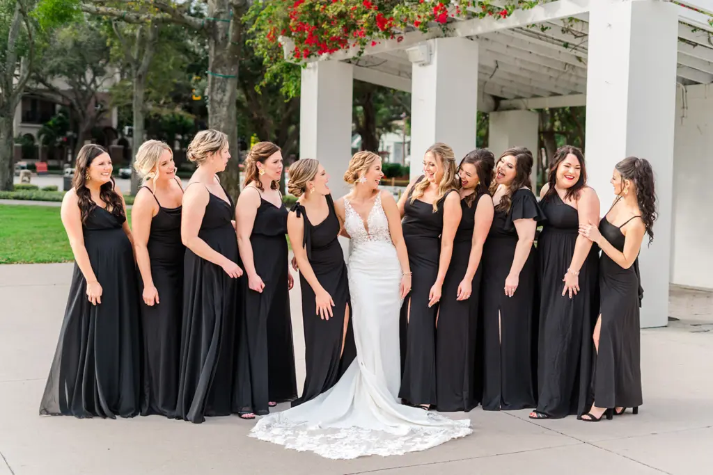 Mismatched Black Satin Floor Length Bridesmaids Dress Inspiration | White Lace Deep V Neckline Fit and Flare Wedding Dress Ideas