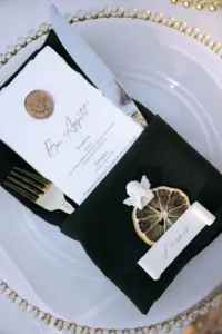 Bon Appetit Italian Inspired Menu Cards with Gold Wax Seal and Dried Lemon Garnish, Black Napkins and Scroll Calligraphy Place Card Wedding Reception Table Setting Inspiration