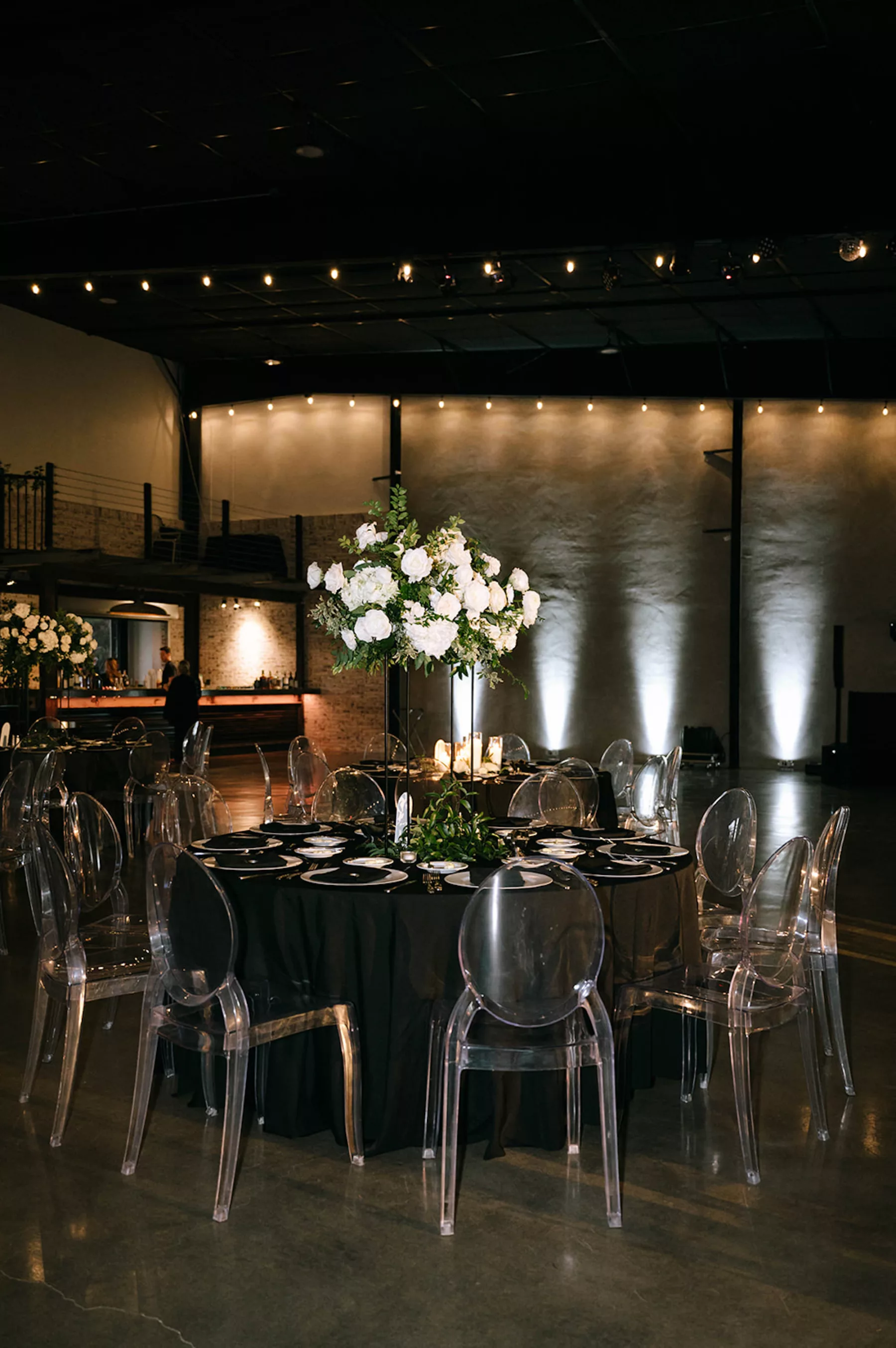 Moody Modern Black and White Wedding Reception Decor Ideas with Acrylic Ghost Chairs | Tampa Bay Event Planner Kelci Leigh Events | Florist Bloom Shakalaka