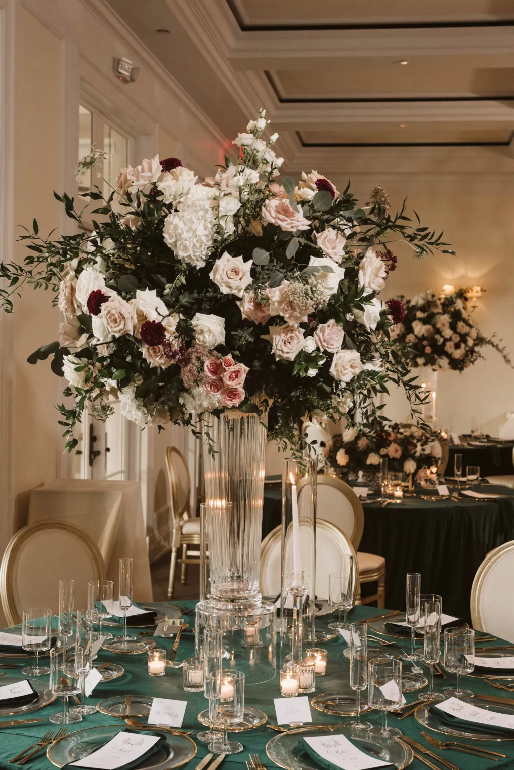 Elegant Tall Flower Vase with Fall White Roses, Pink Roses, Hydrangeas, Purple Chrysanthemums, and Greenery Wedding Reception Centerpiece Decor Inspiration | Tampa Bay Florist Bruce Wayne Florals
