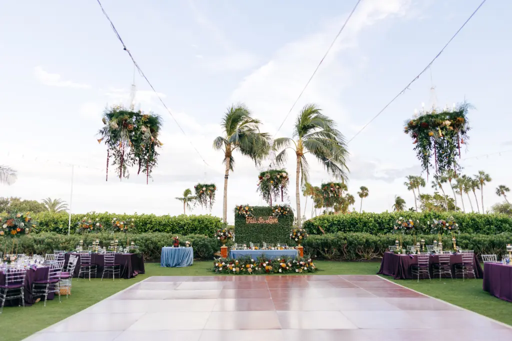 Purple Dark Moody Fall Jewel Toned Halloween Inspired Outdoor Wedding Reception Decor Ideas | Sarasota Event Venue The Resort at Longboat Key Club