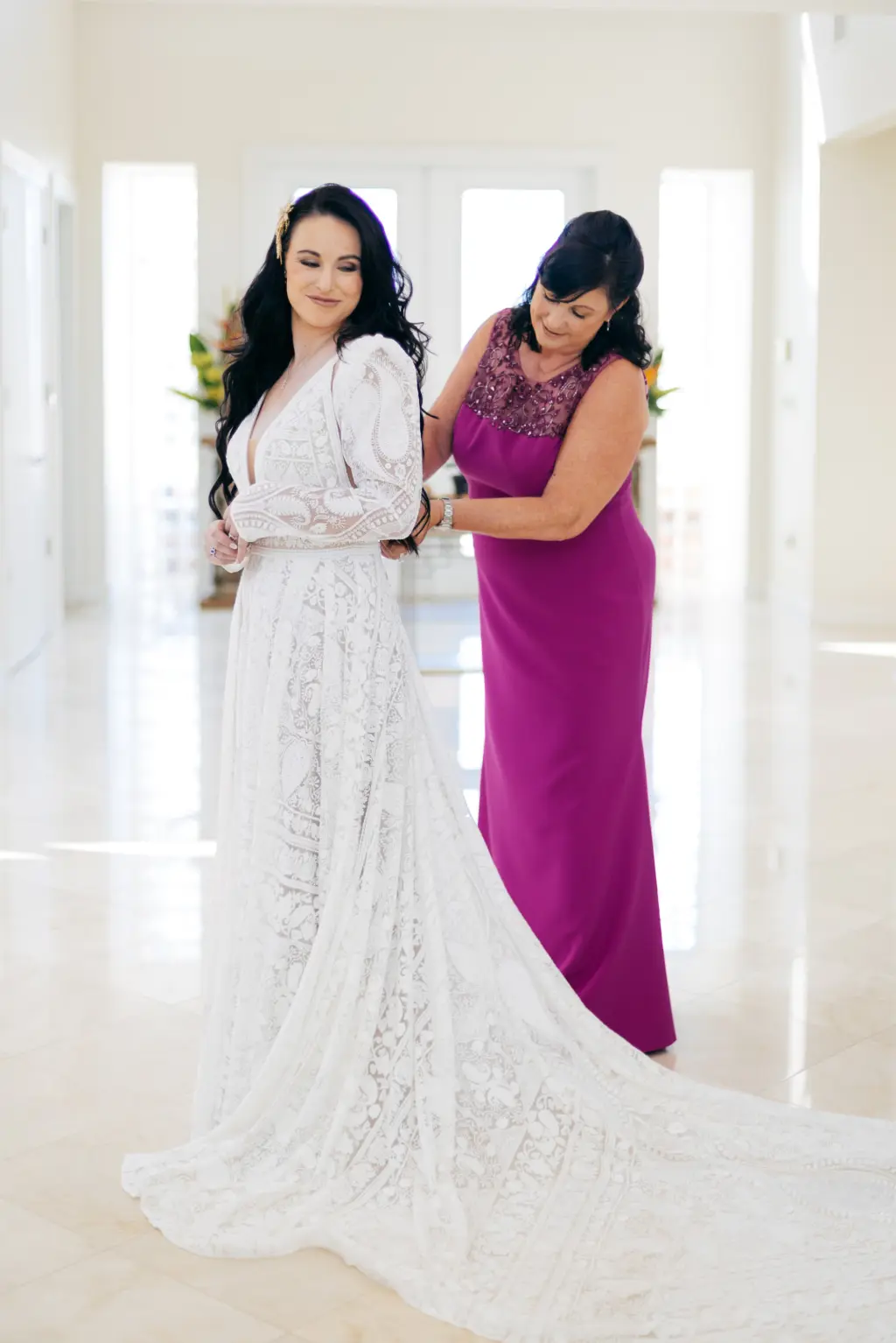 Elegant Bridal Hair and Makeup Inspiration | Bride Getting Ready with Mother | White and Nude Boho Lace Rue de Seine Wedding Dress with Removable Sleeves | Orchid Purple Mother of the Bride Dress Ideas