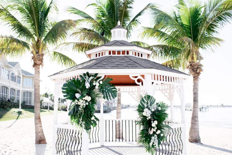 Tropical Wedding Ceremony Inspiration | Monstera, Palm Leaf, and White Roses Gazebo Decor Ideas | St Pete Event Venue Isla Del Sol Yacht and Country Club