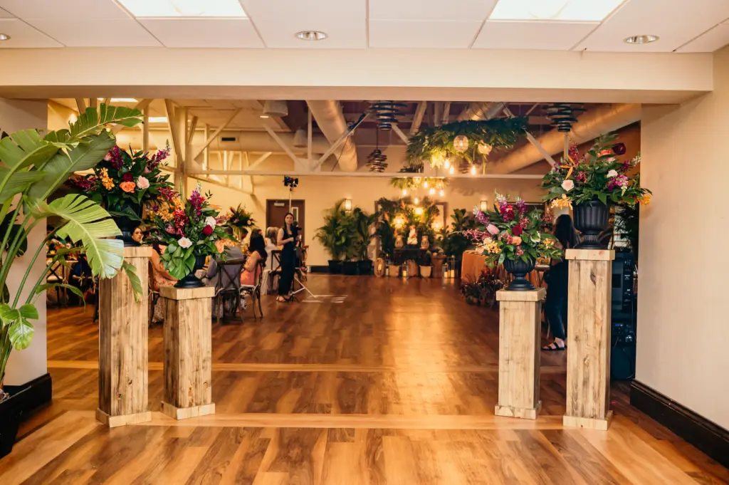 Wooden Podium Column for Tropical Flower Arrangement | Wedding Ceremony Entrance Decor Ideas | Tampa Bay Florist Save The Date Florida | St. Petersburg Event Venue Sunken Gardens