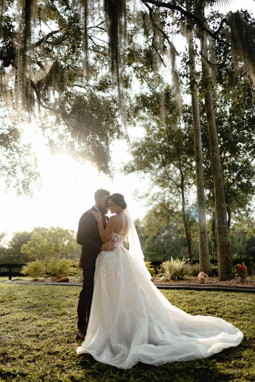 Romantic Bride and Groom Sunset Wedding Portrait | Outdoor Florida Wedding Ceremony Decor Ideas | Brooksville Event Venue La Hacienda on Snow Hill | Florida Planner The Olive Tree Weddings