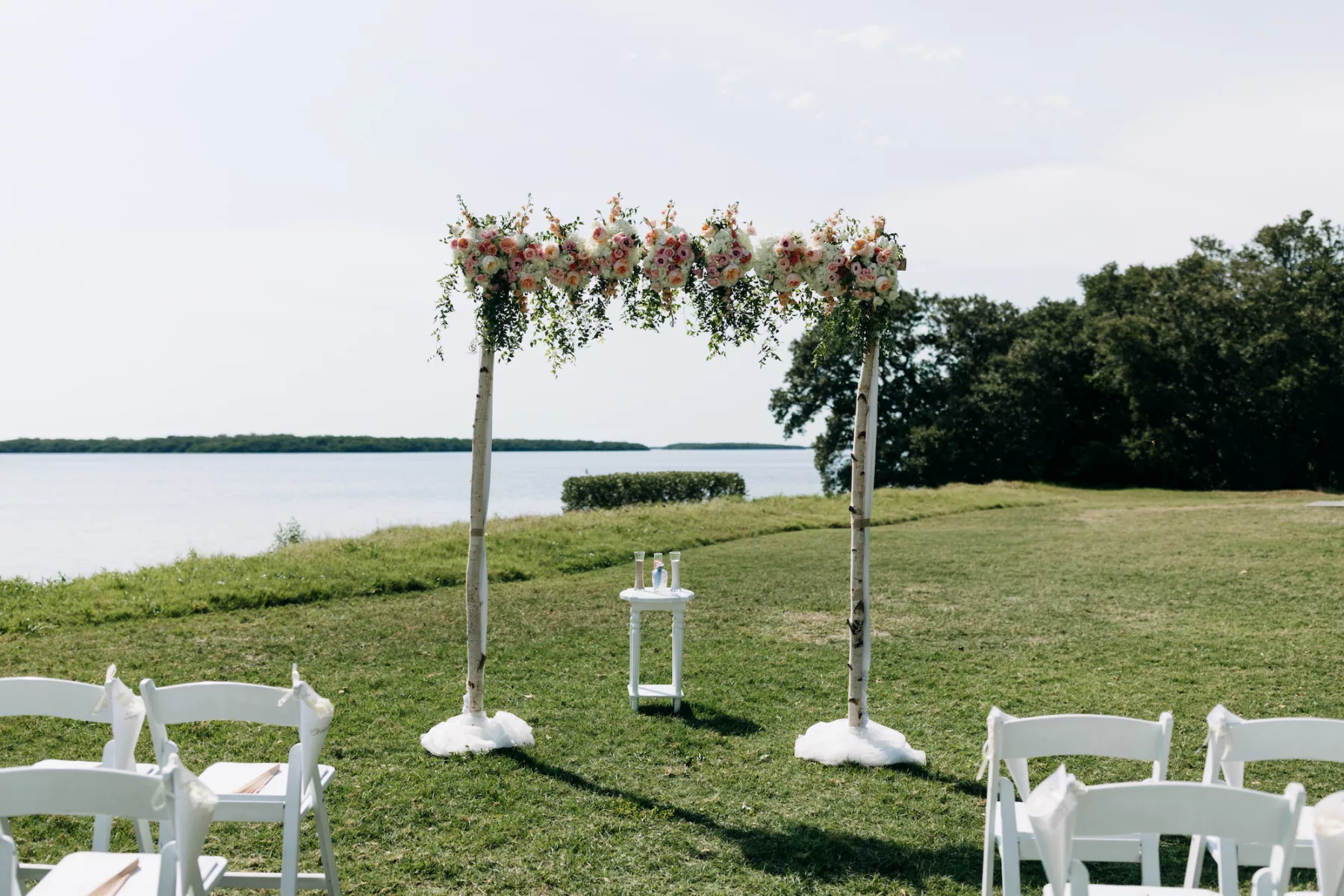 Wedding Arch with Pink Garden Roses, Orange Ranunculus, White Hydrangeas, and Greenery Summer Floral Arrangement Decor Ideas | Tampa Bay Florist Beneva Flowers