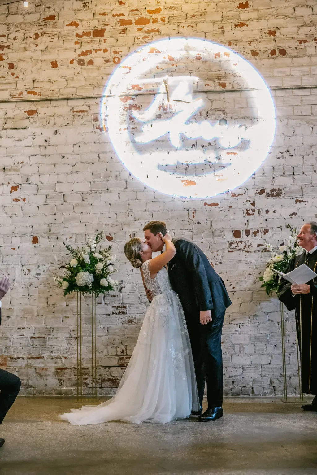 Bride and Groom First Kiss Wedding Portrait | Wedding Gobo Projection Grant Hemond & Associates